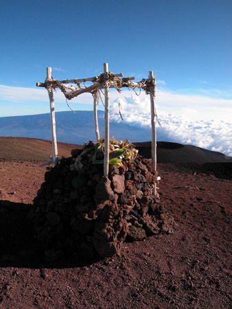 Shrine at summit of Mauna Kea with Mauna Loa in the background